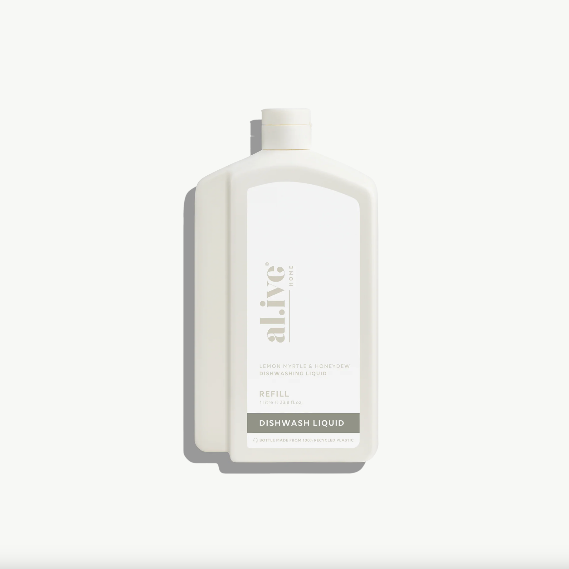 Dishwash liquid bottle labeled 'alive' on a white background