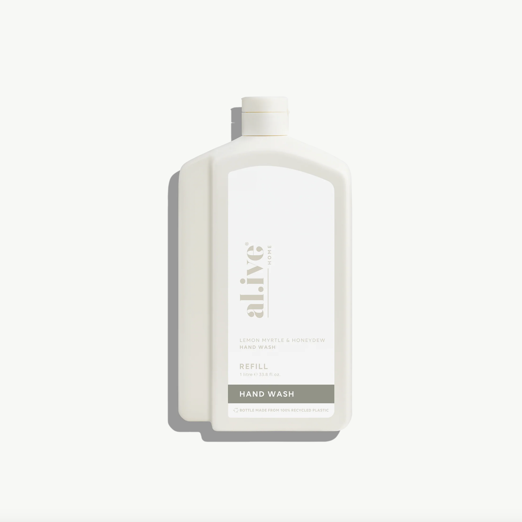 White bottle of hand wash on a light gray background