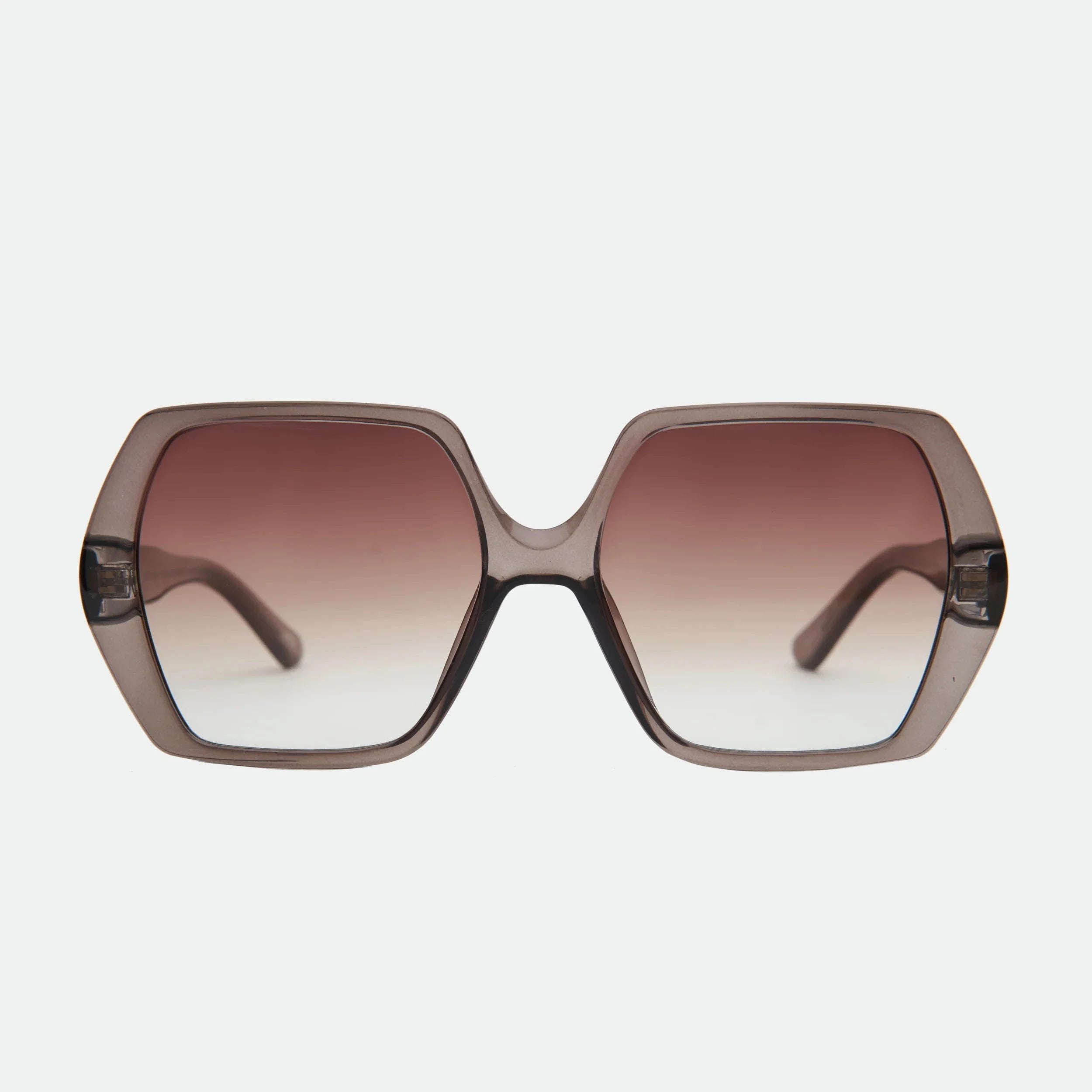 Sunglasses with a gradient brown lens on a light gray background