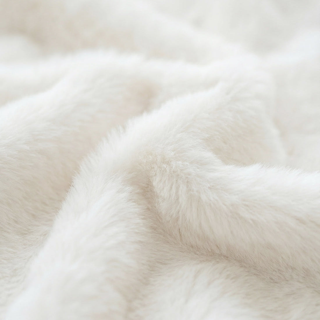 Close-up of white fur jacket texture