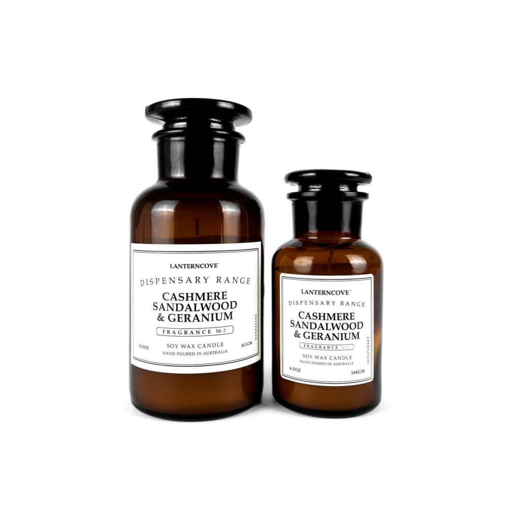 Two amber glass bottle candles with labels by Lanterncove 