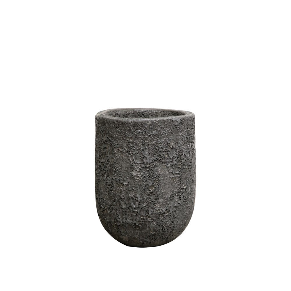 Textured black pot on a white background