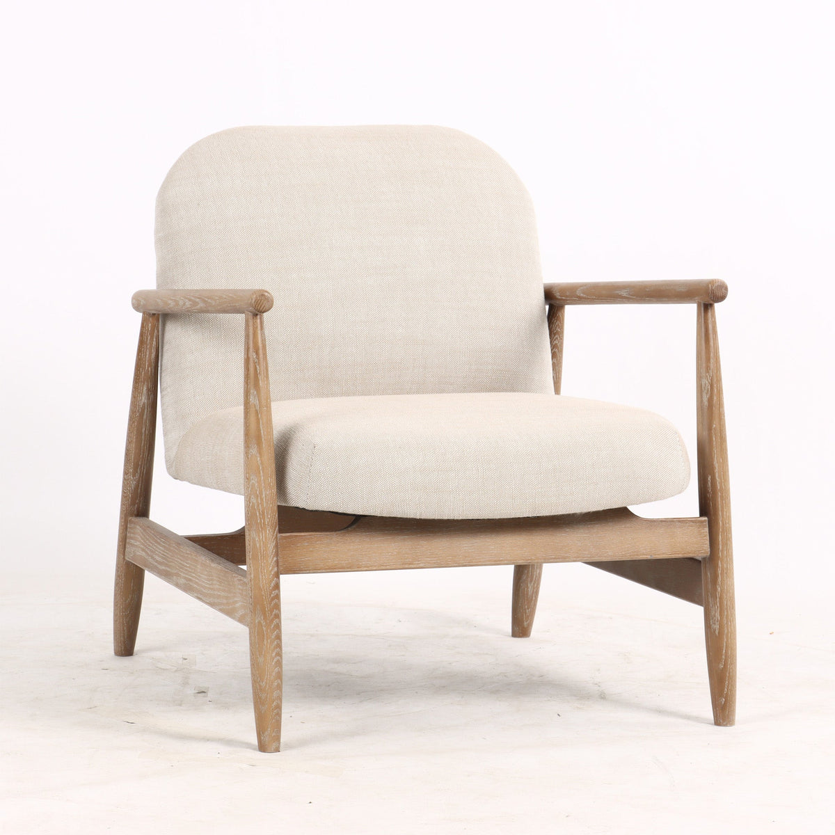 Beige armchair with wooden frame on a white background