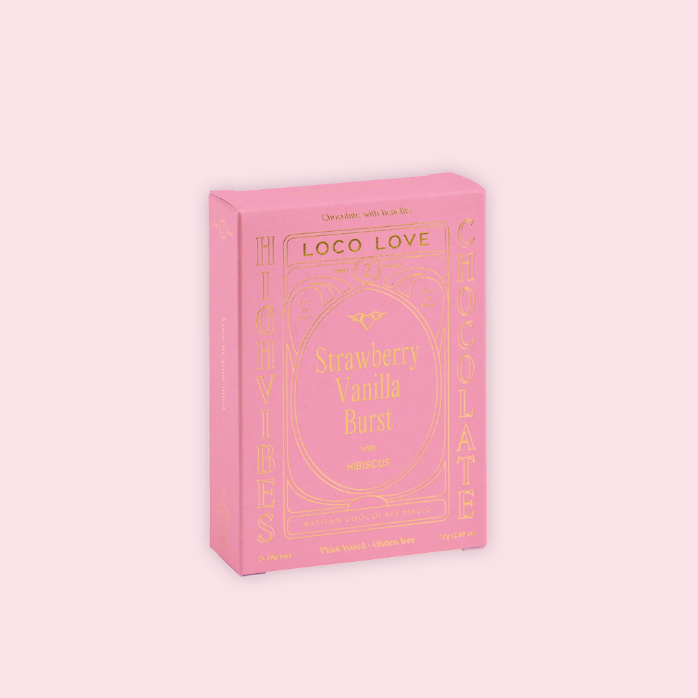 Pink packaging of Strawberry Vanilla Burst with 'LOCO LOVE' branding on a light pink background