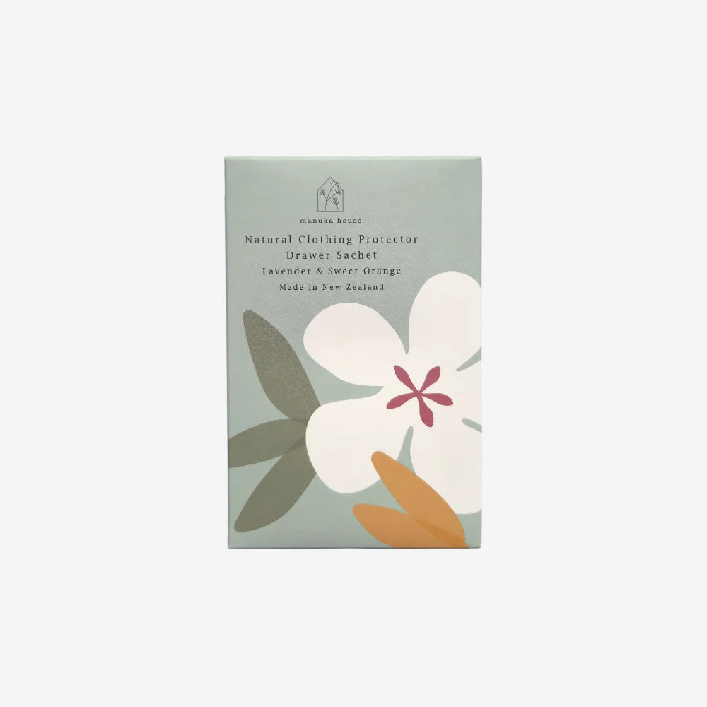 Package of a natural clothing protector with floral design on a light gray background