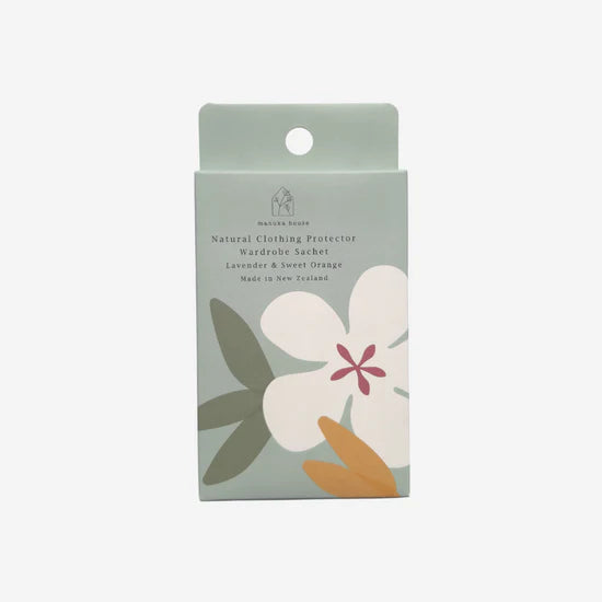 Floral packaging of a natural clothing protector on a light gray background