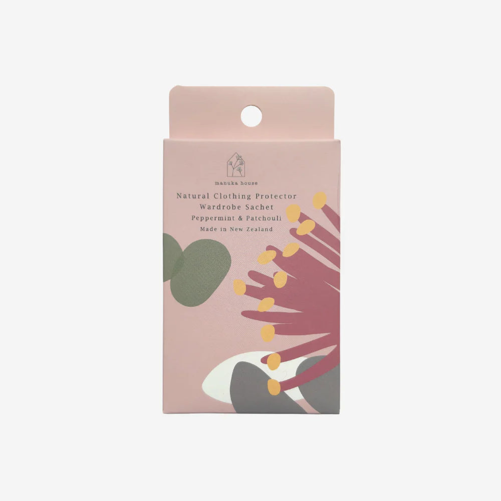 Package of a natural clothing protector with floral design on a light pink background