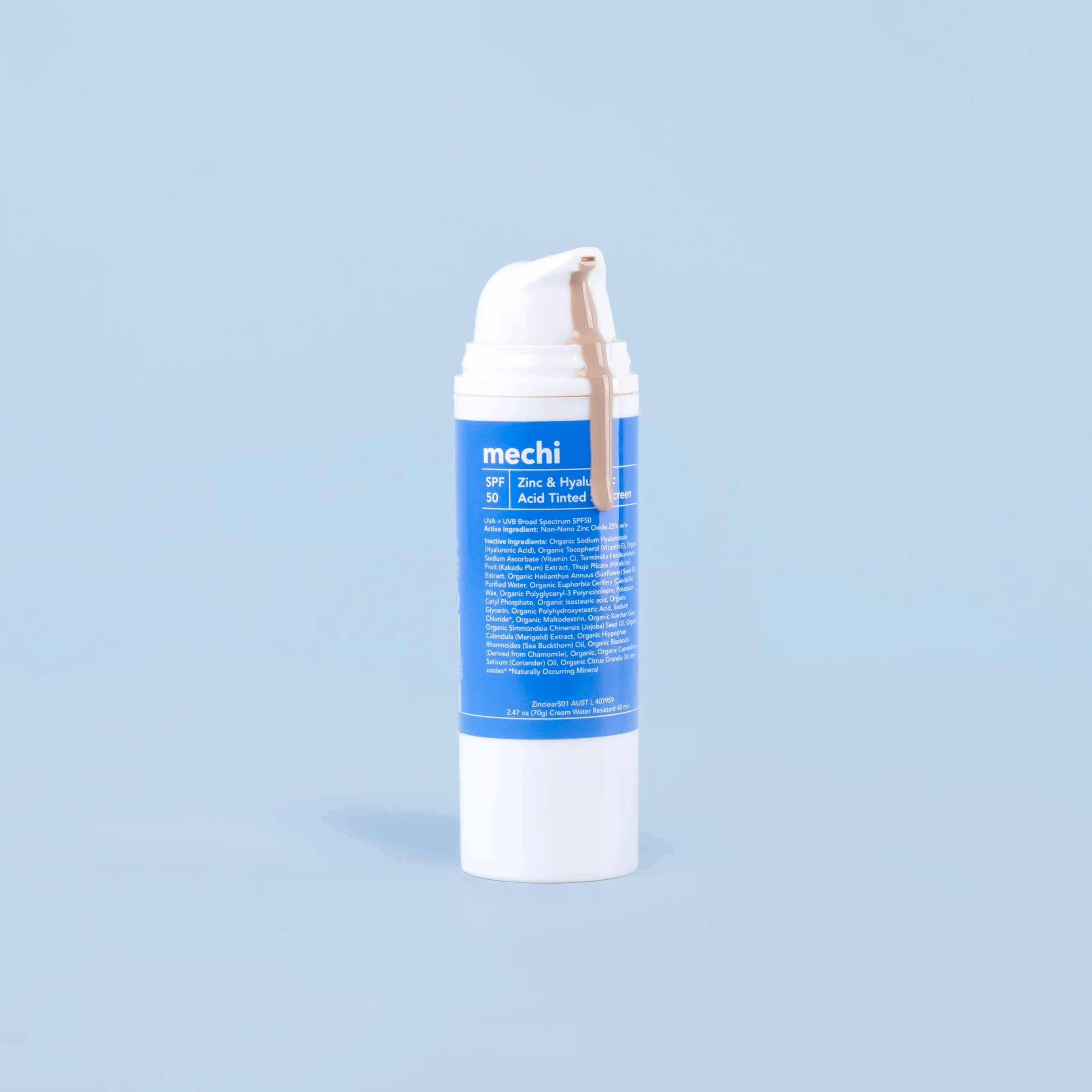 Skincare product with 'mechi' branding on a light blue background