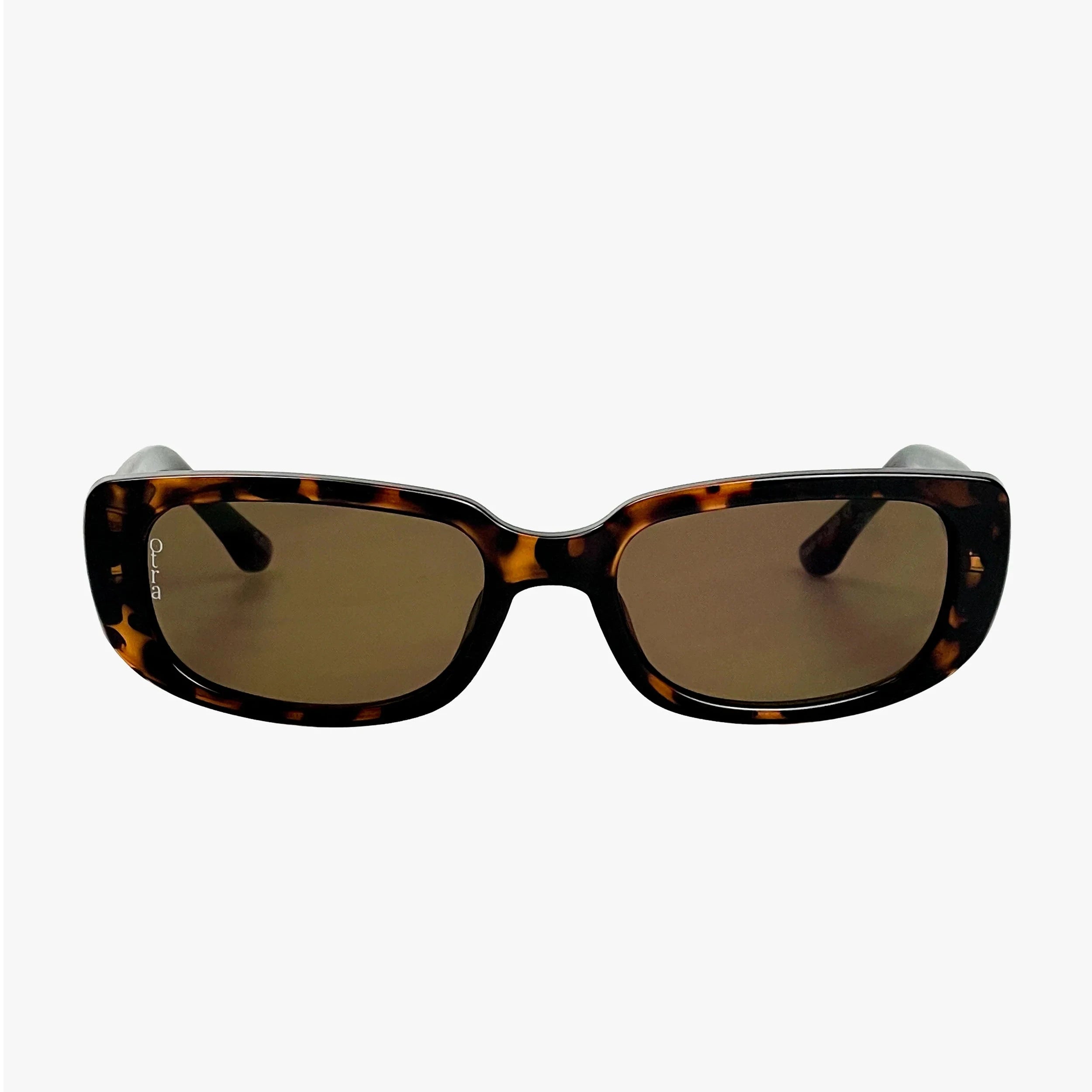 Sunglasses with tortoiseshell frame and brown lenses on a white background