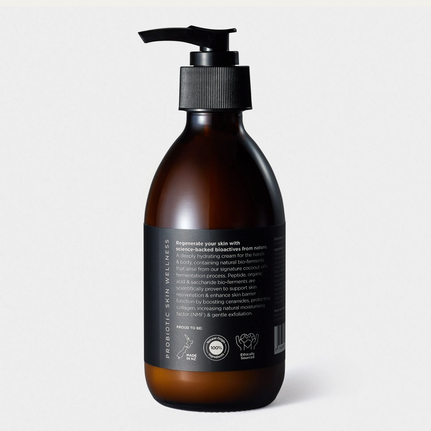 Brown bottle with black pump on a white background