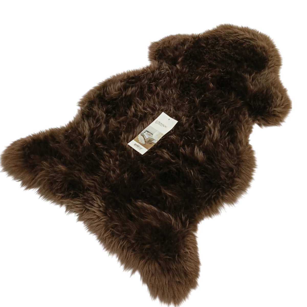 A dark brown New Zealand sheepskin rug with a natural hide shape, featuring a small  shown on a plain white background.