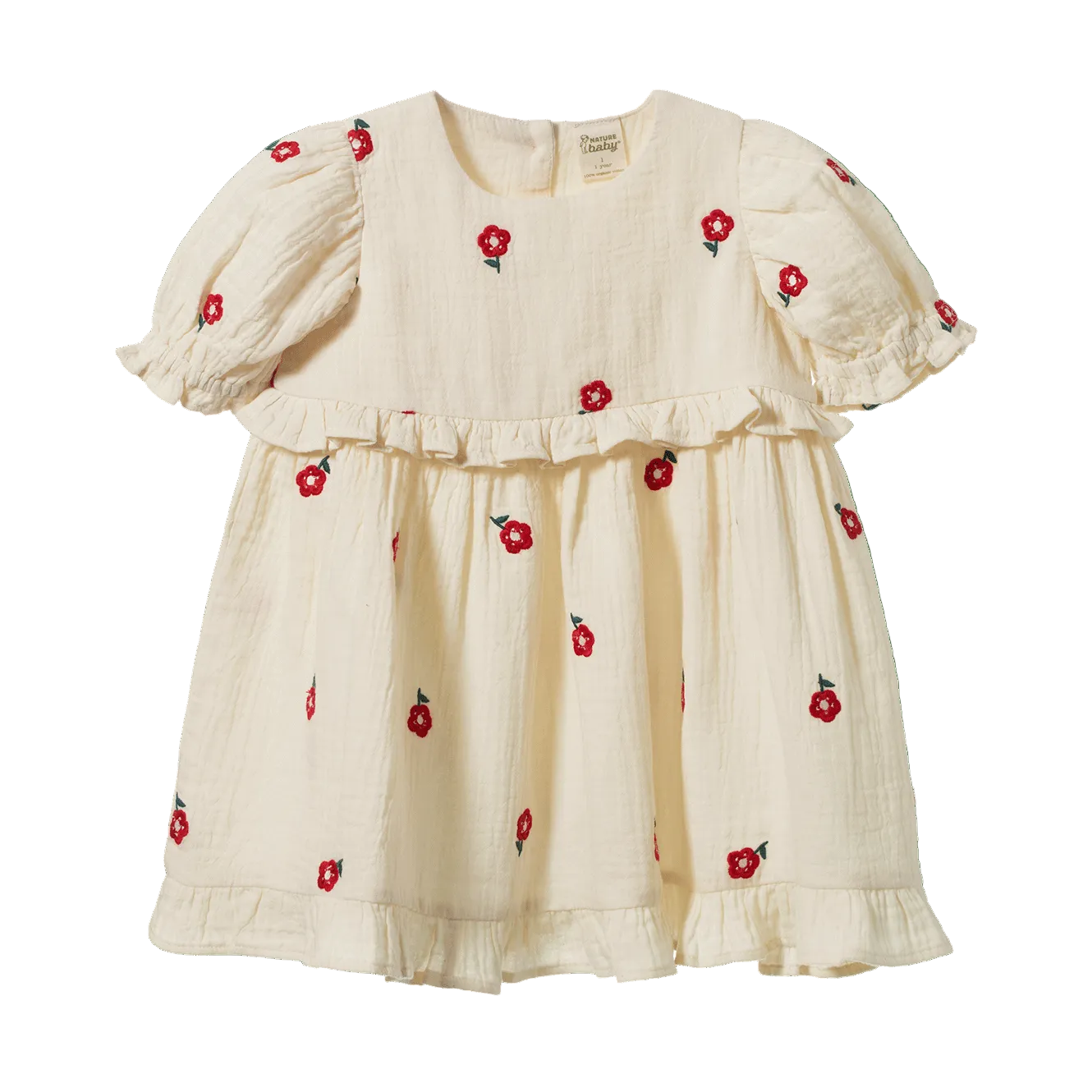 An off-white cotton gauze baby dress with red floral embroidery, featuring puff sleeves, a ruffled neckline, and a ruffled hem, shown against a plain white background.
