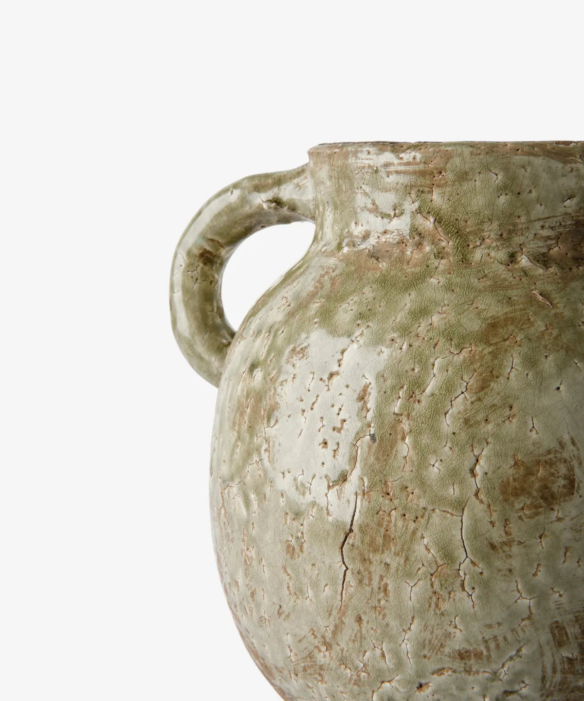 Close-up of a ceramic vase with a rounded body, a single loop handle, and a heavily textured, crackled glaze in muted sage green and earthy brown tones against a plain white background.