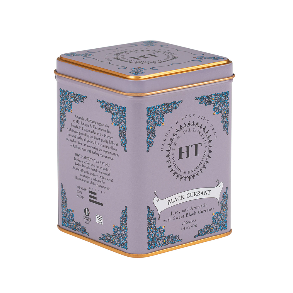 Decorative Blackcurrant tea tin with intricate designs and text on a white background