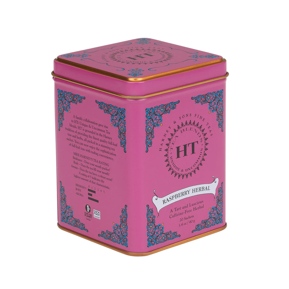 Pink raspberry tea tin with decorative elements and text on a white background