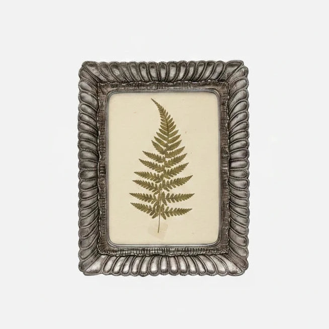 An ornate rectangular picture frame with a textured, scalloped metallic border in a silver finish, shown empty against a light gray background. The brand name 'Jewelry Country' is subtly printed on the center of the insert.