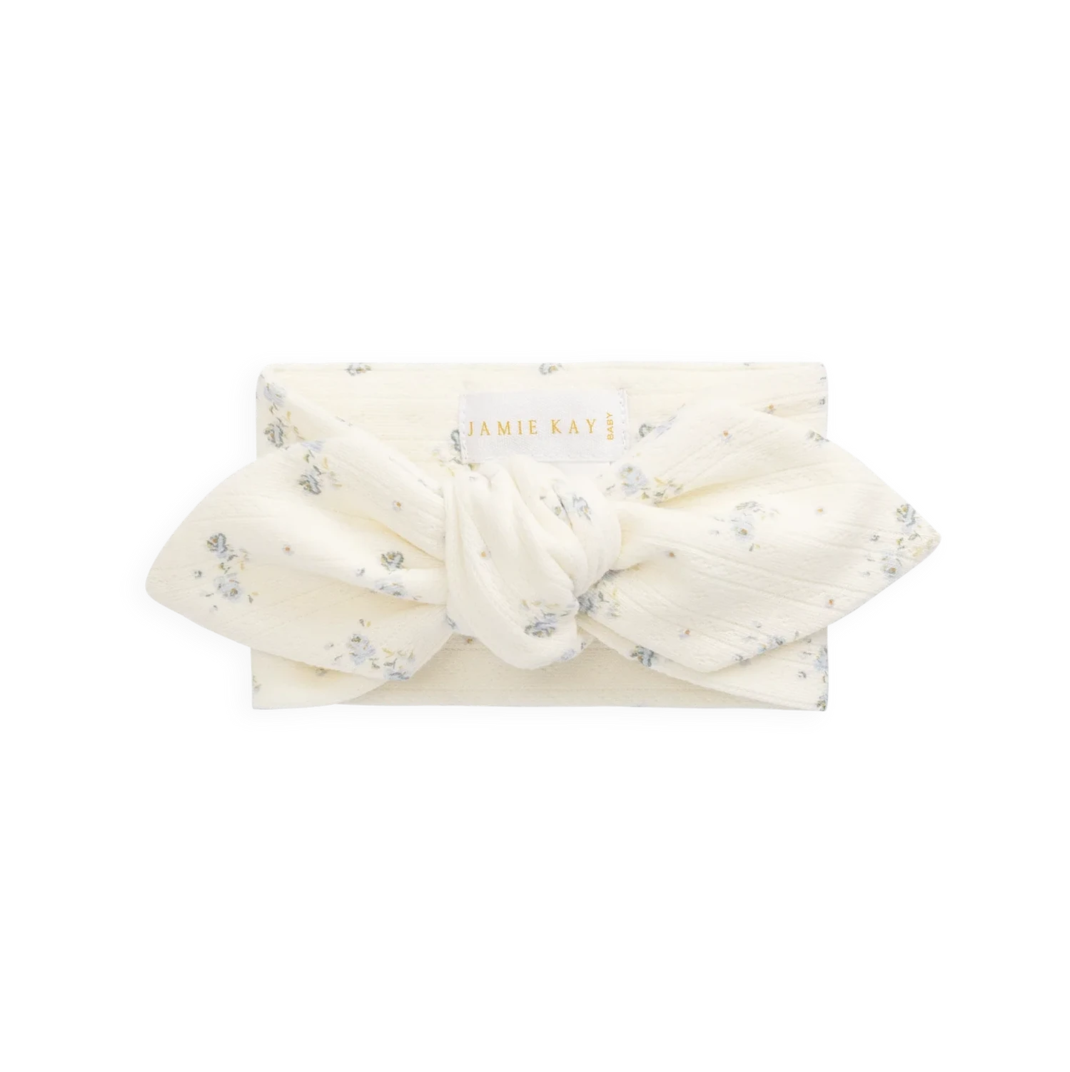 White headband with floral details on a white background
