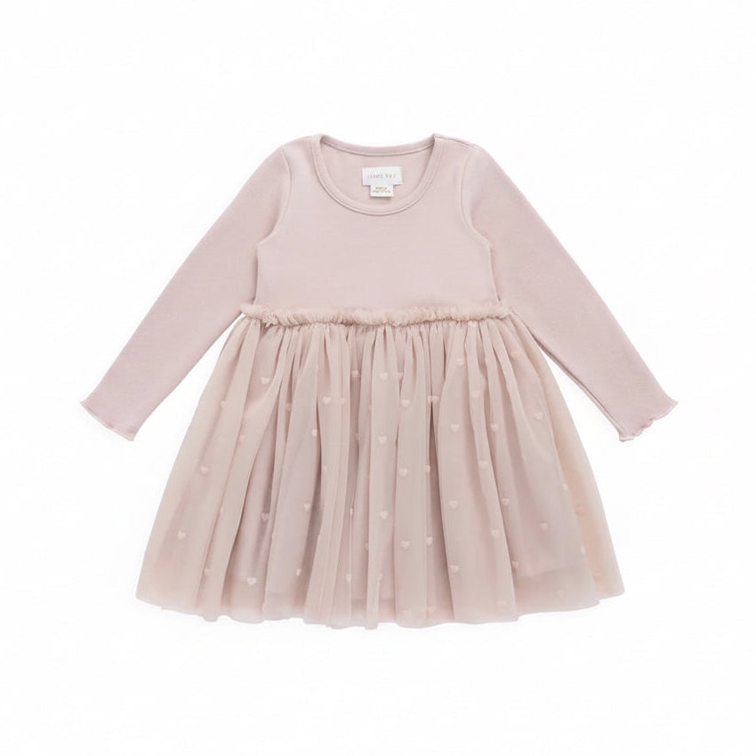 Pink dress with a tulle skirt on a white background