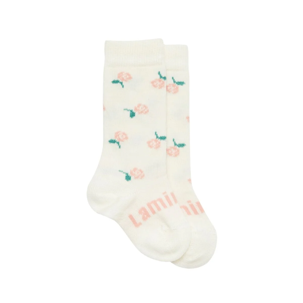 White sock with floral patterns and 'Lamington' branding on a white background