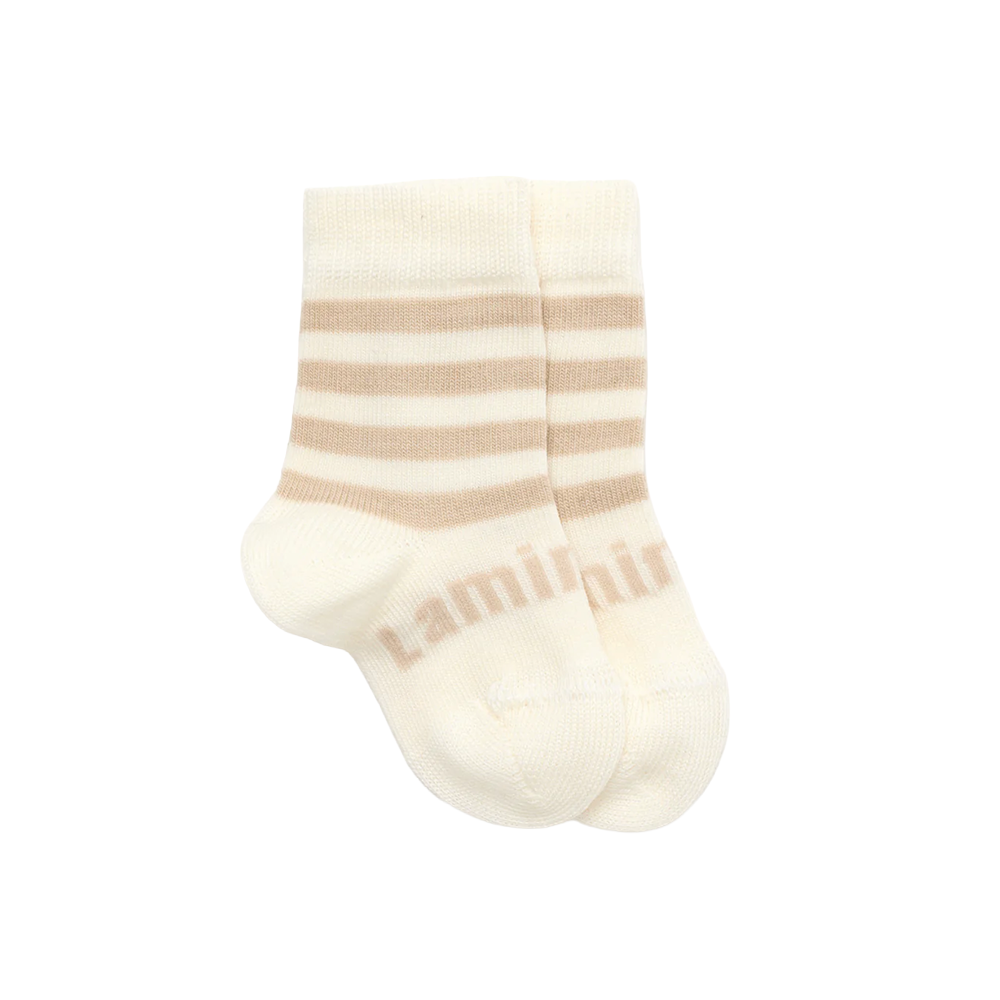 Pair of cream socks with beige stripes on a white background