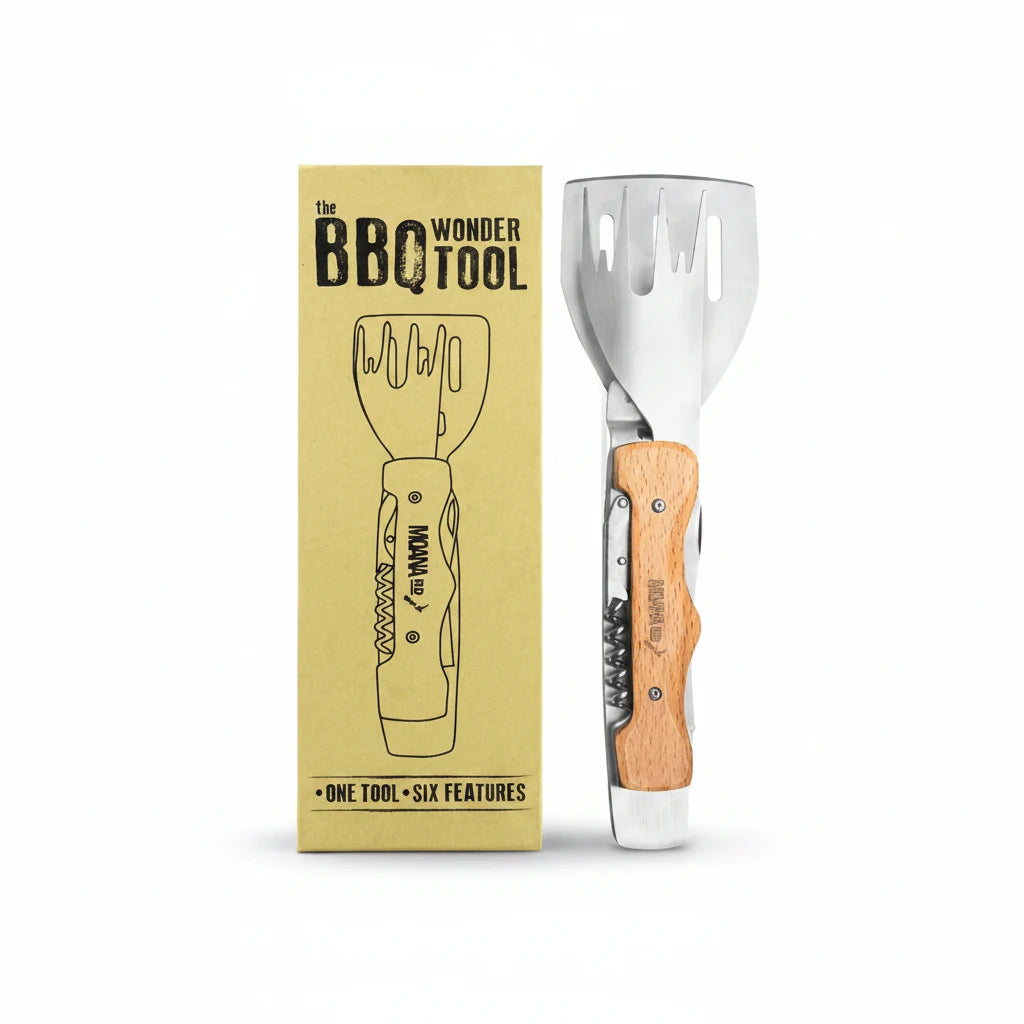 Barbecue wonder tool with wooden handle and metal components next to its packaging.