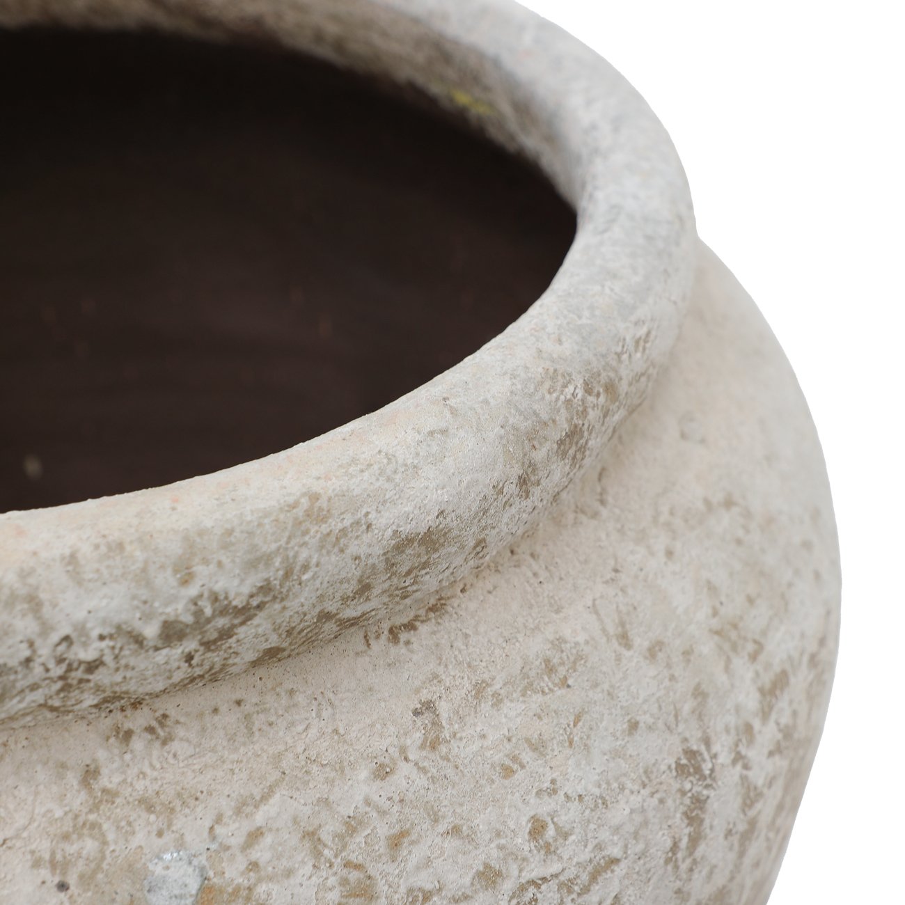 Close-up of a textured ceramic pot on a white background