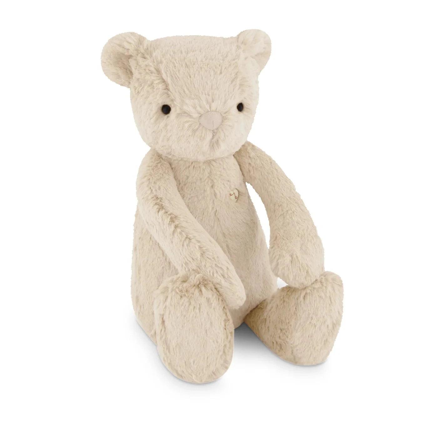 Beige teddy bear on a white background