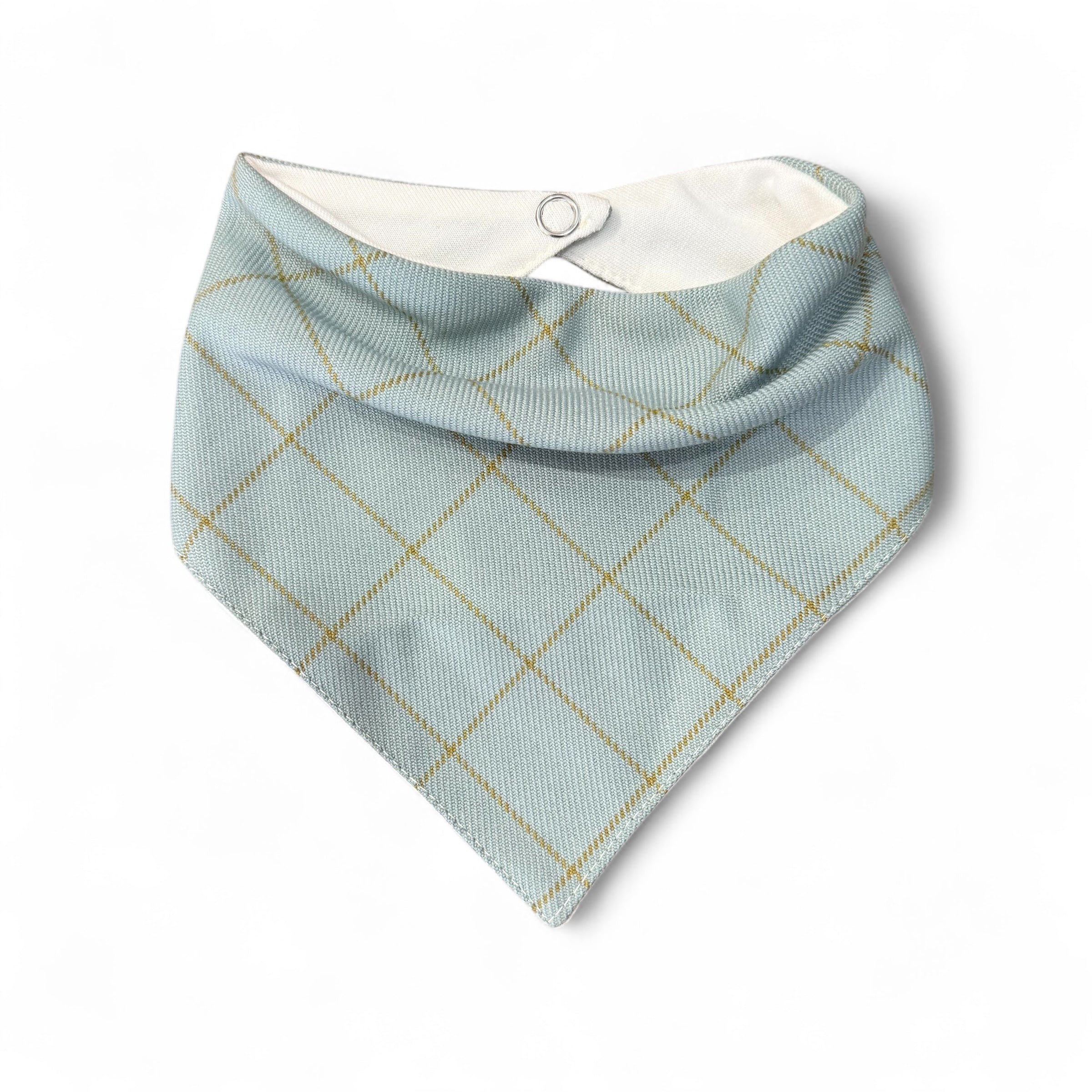 Blue diamond patterned bandana bib on a white background