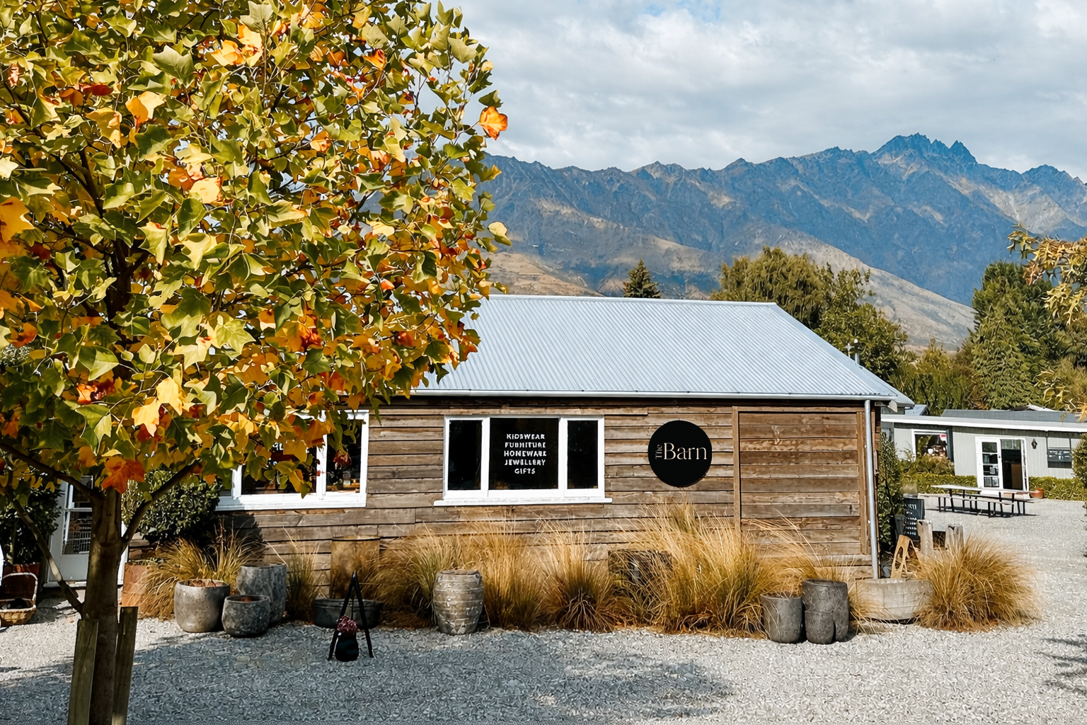 The Barn Queenstown building with The Remarkables mountain range background