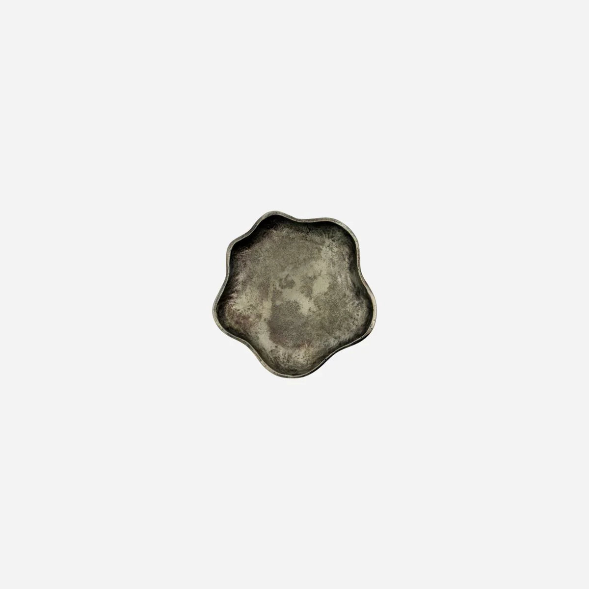 Small antique metal trinket tray on a white background