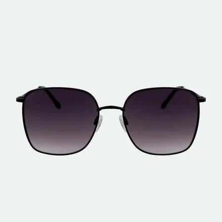 Sunglasses with gradient lenses on a light gray background